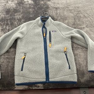 Boys Patagonia light gray jacket with royal blue trim. XXL size 16-18 so warm
